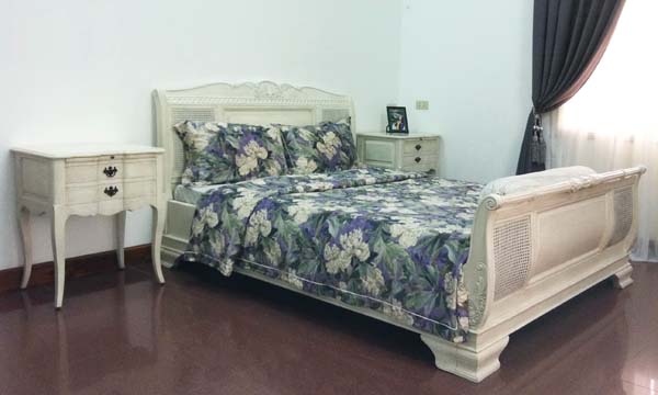 White bed and night stand